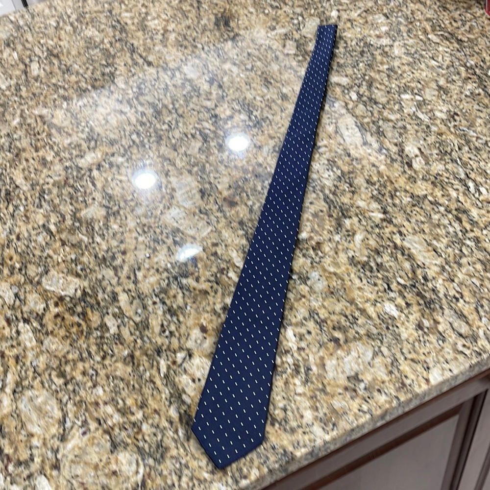 Worn maybe twice Burberry tie in Navy, beautiful condition as shown.